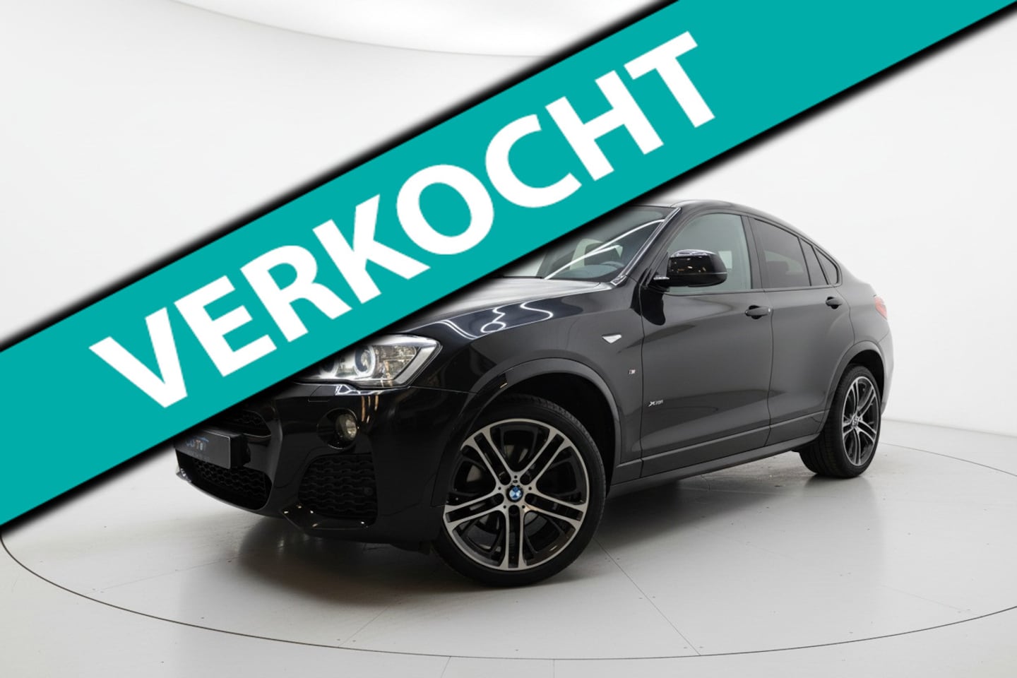 BMW X4 - XDrive20i High Executive M SPORT LEER CAMERA HUD - AutoWereld.nl