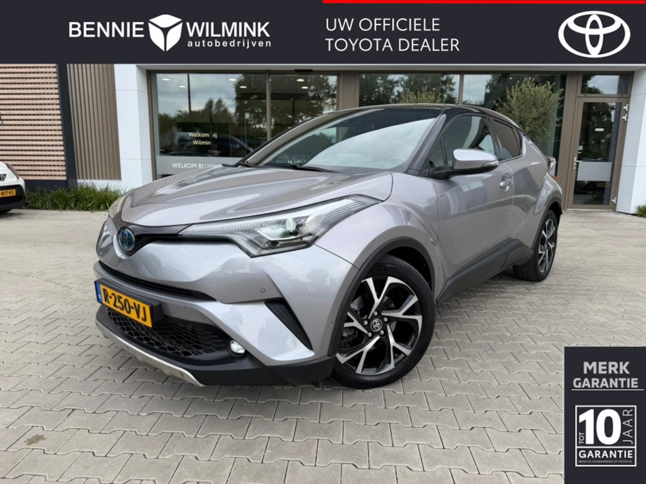 Toyota C-HR - 1.8 Hybrid Bi-Tone Edition | Lederen bekleding | Stoelverwarming - AutoWereld.nl