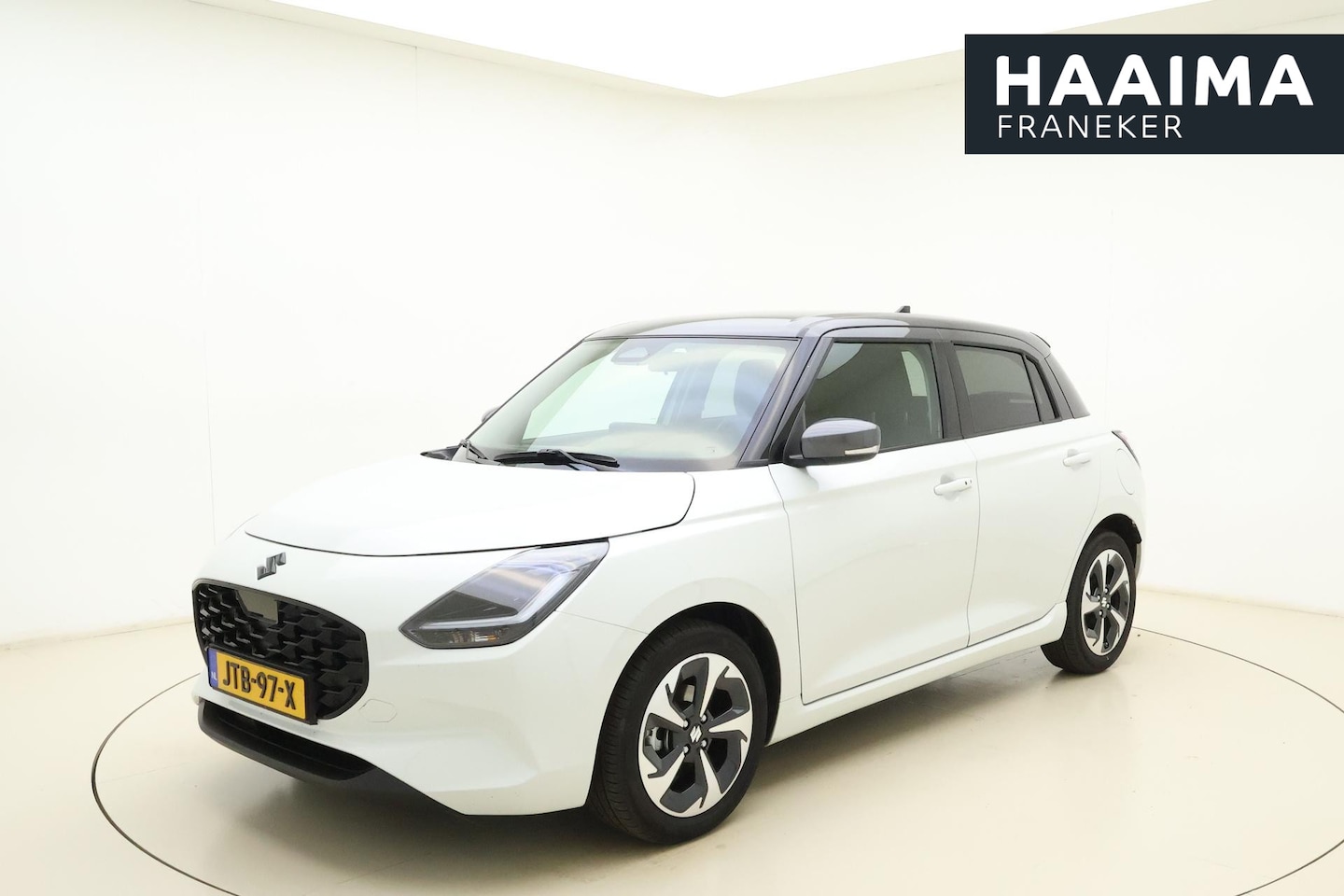 Suzuki Swift - 1.2 Style Smart Hybrid | Navigatie | Cruise control | Climate control | Achteruitrijcamera - AutoWereld.nl