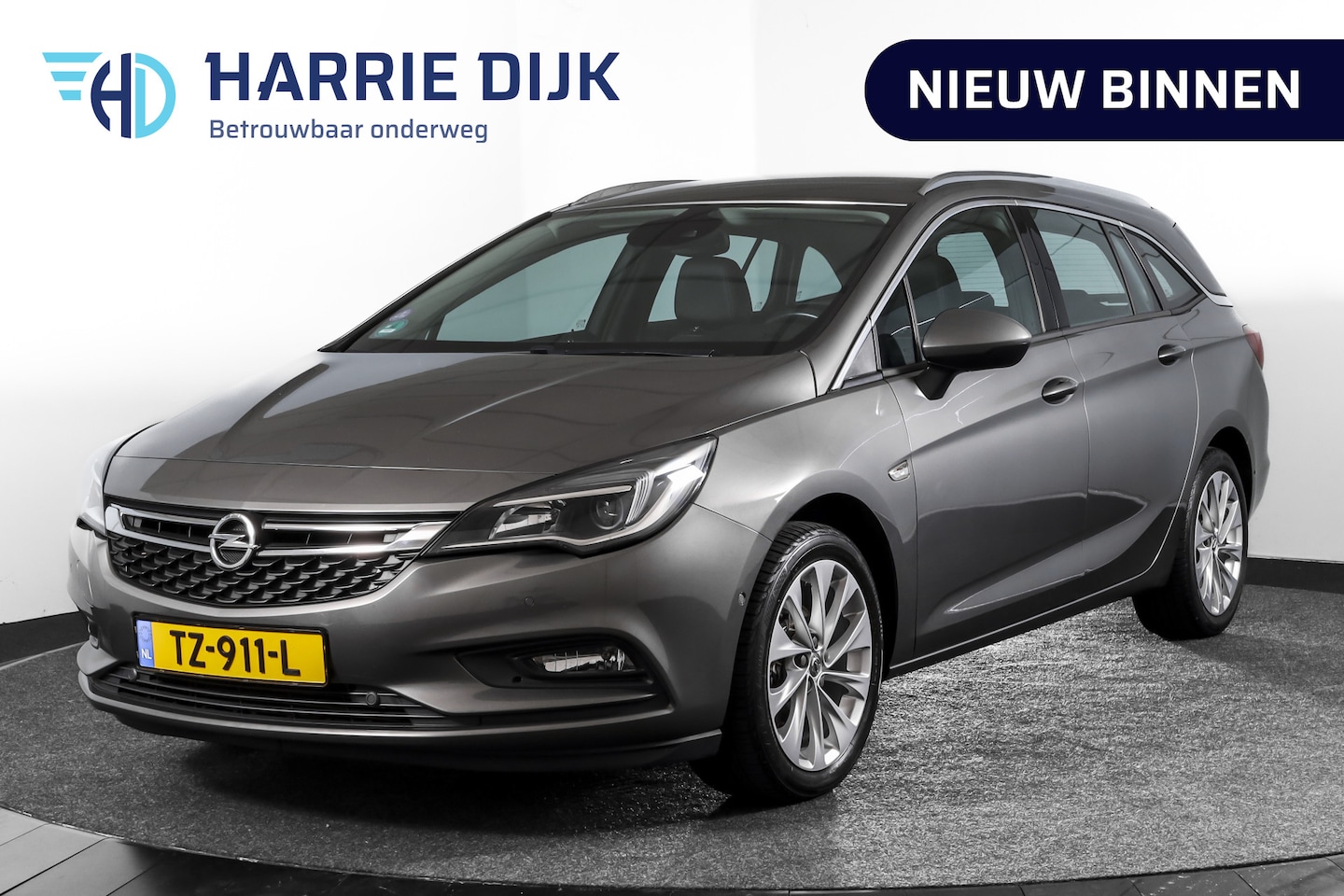 Opel Astra Sports Tourer - 1.4 Turbo S/S 126 PK | Cruise | PDC | Camera | NAV + App. Connect | ECC | Elek. Klep | Tre - AutoWereld.nl
