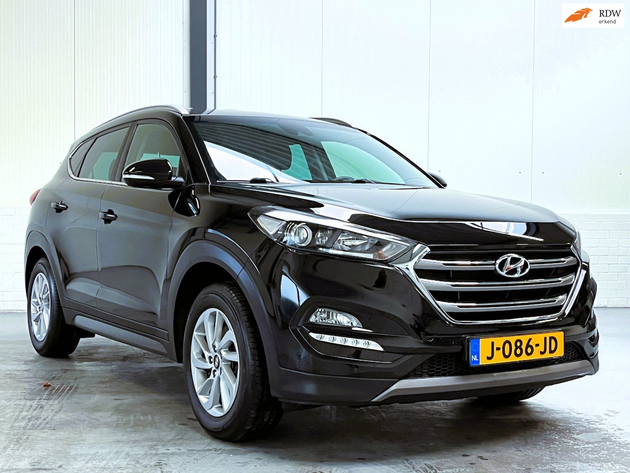 Hyundai Tucson - 1.6 GDi Premium|Leder Trekhaak|Camera - AutoWereld.nl
