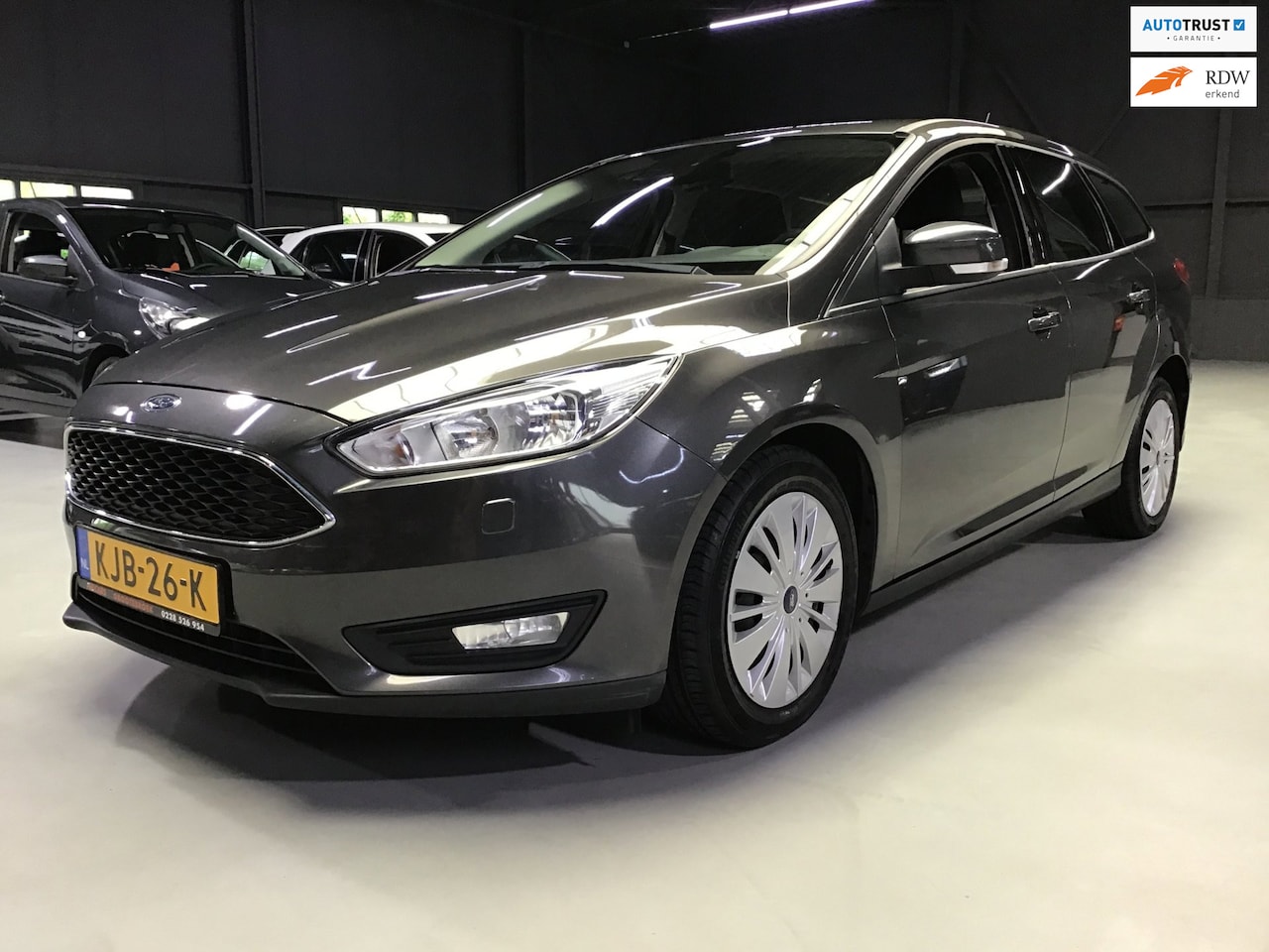 Ford Focus Wagon - 1.0 Titanium I 1e Eigen. I Navi I Clima I Cruise I Stoelverw I Carplay I 6bak I 125PK I BT - AutoWereld.nl