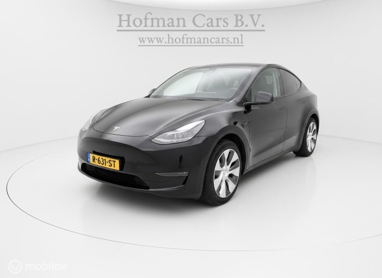 Tesla Model Y - RWD 2022 Zwart | 92% SOH | LFP Accu | Warmtepomp | Michelin 4-Seasons | Garantie - AutoWereld.nl