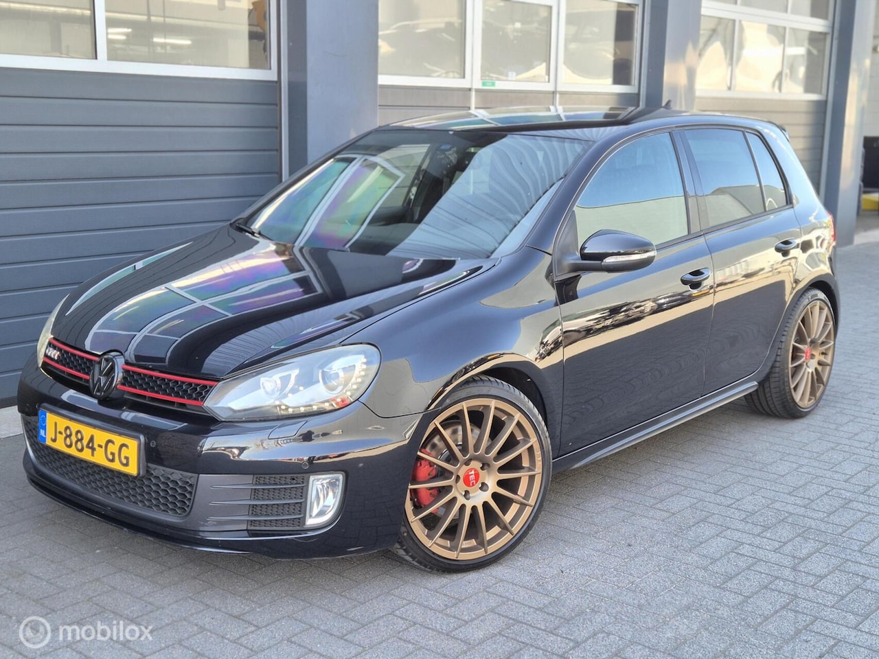 Volkswagen Golf - 2.0 GTI DSG | CARLPAY | SPORTUITLAAT | 19'' | NAVI | XENON | PDC | - AutoWereld.nl