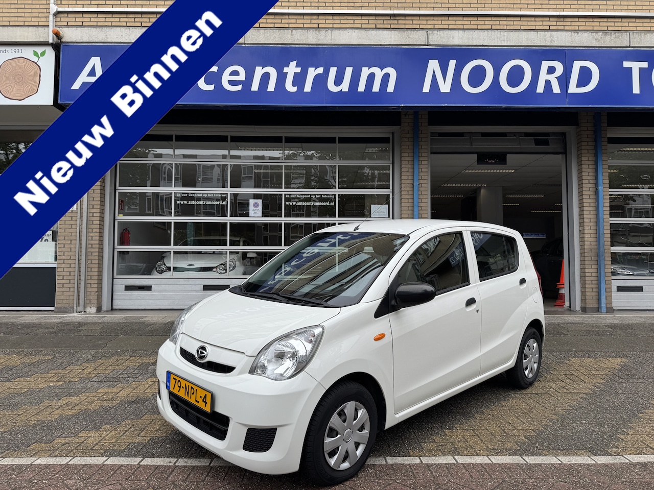 Daihatsu Cuore - 1.0 Trend 82864KM! NAP | 1e Eigenaar | Centrale deurvergrendeling | 5 Deurs | - AutoWereld.nl