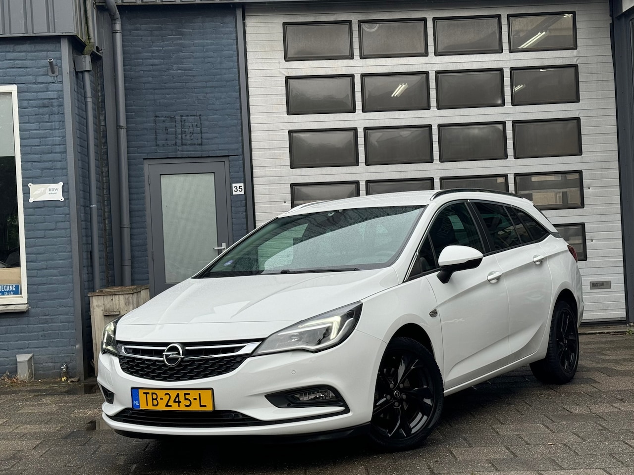 Opel Astra Sports Tourer - 1.0 Online Edition | Clima | Cruise | Navi | PDC V+A - AutoWereld.nl