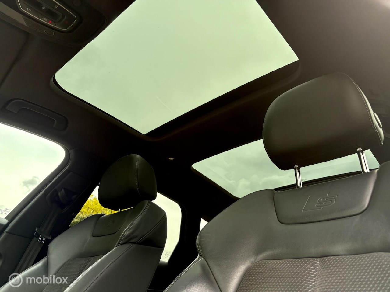 Audi A6 Avant - 55 TFSIe Quattro Comp|S-Line|Pano|SOH92% - AutoWereld.nl