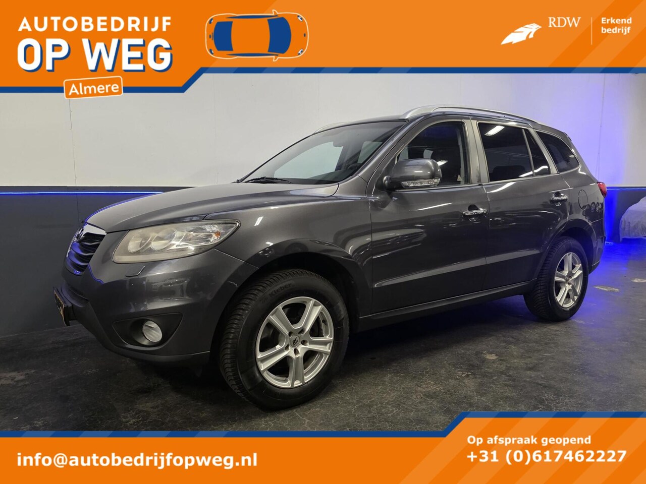 Hyundai Santa Fe - 2.4i CVVT Style | Trekhaak | Camera | Cruise Control | Stoelverwarming - AutoWereld.nl