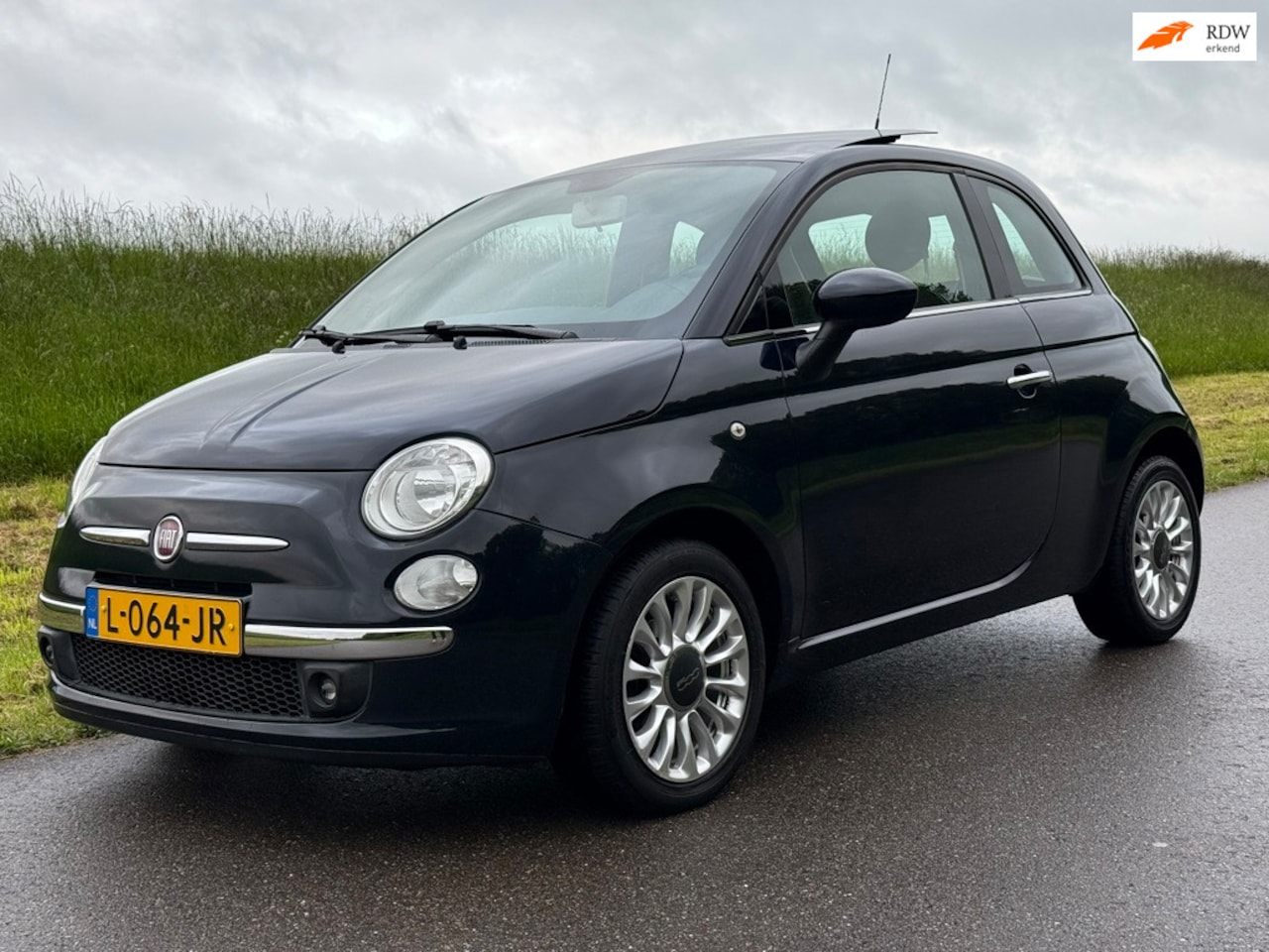 Fiat 500 - 1.2 Lounge | Schuif/kanteldak | Parkeersensoren | Airco - AutoWereld.nl