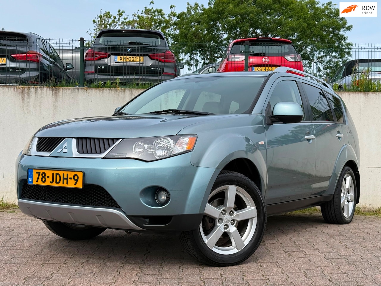 Mitsubishi Outlander - 2.4 Instyle/AUTOMAAT/LEDER/CLIMA/TREKHAAK/APK 02-2027/ - AutoWereld.nl