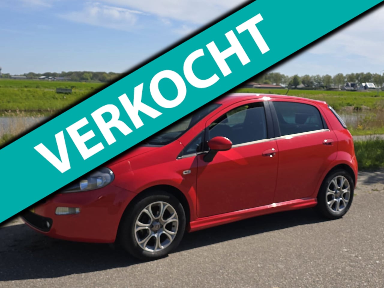 Fiat Punto Evo - 0.9 TwinAir Lounge LAGE KM !! - AutoWereld.nl