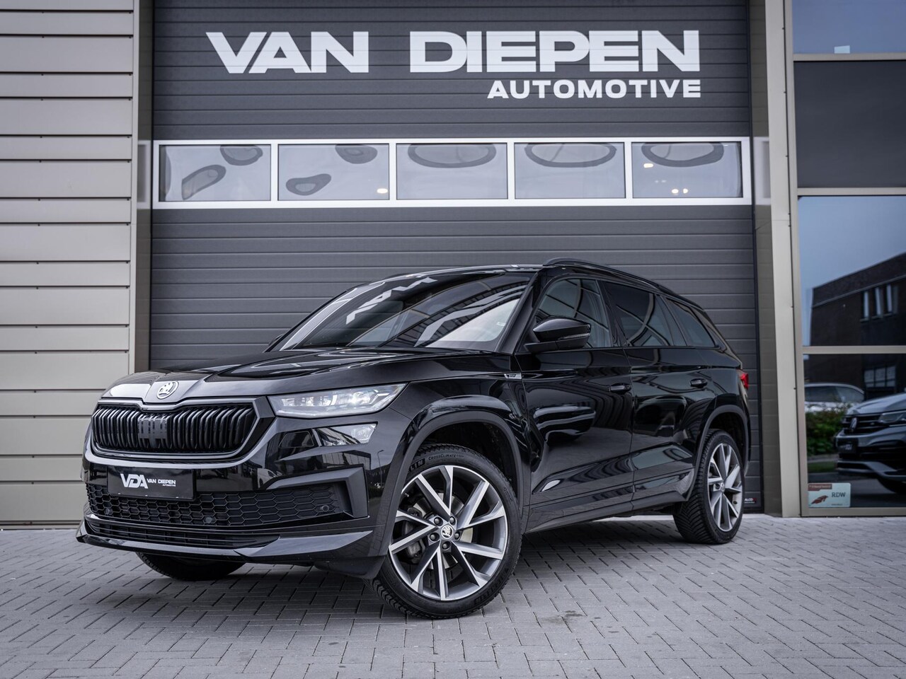 Skoda Kodiaq - 1.5 TSI Business Edition Plus 7p. - Sportline l ACC l Trekhaak l Memory l 20'' - AutoWereld.nl