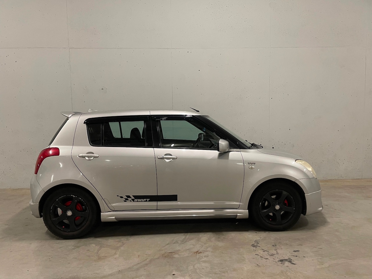 Suzuki Swift - 1.5 Exclusive 5drs. Airco Trekhaak - AutoWereld.nl