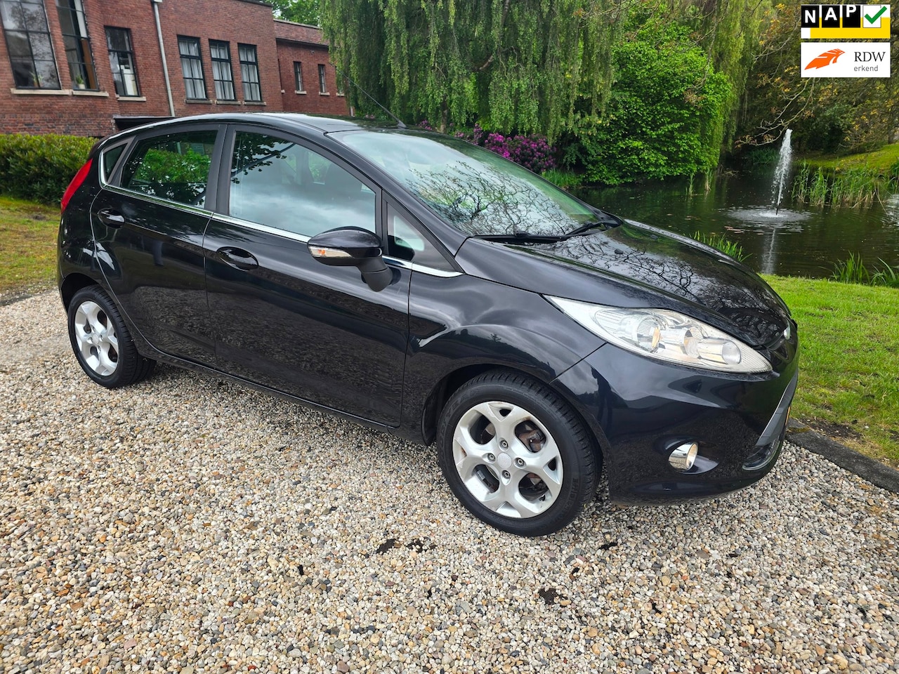 Ford Fiesta - 1.4 Titanium Airco 5-Deurs trekhaak - AutoWereld.nl