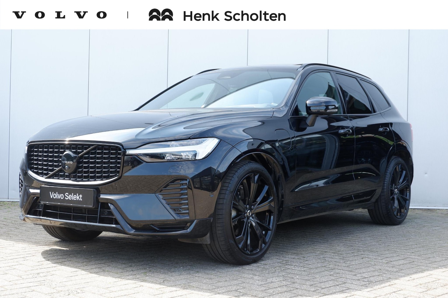 Volvo XC60 - T6 Plug-in hybrid AWD Ultra Black Edition | Panoramadak | Luchtvering | Verwarmbare voorst - AutoWereld.nl