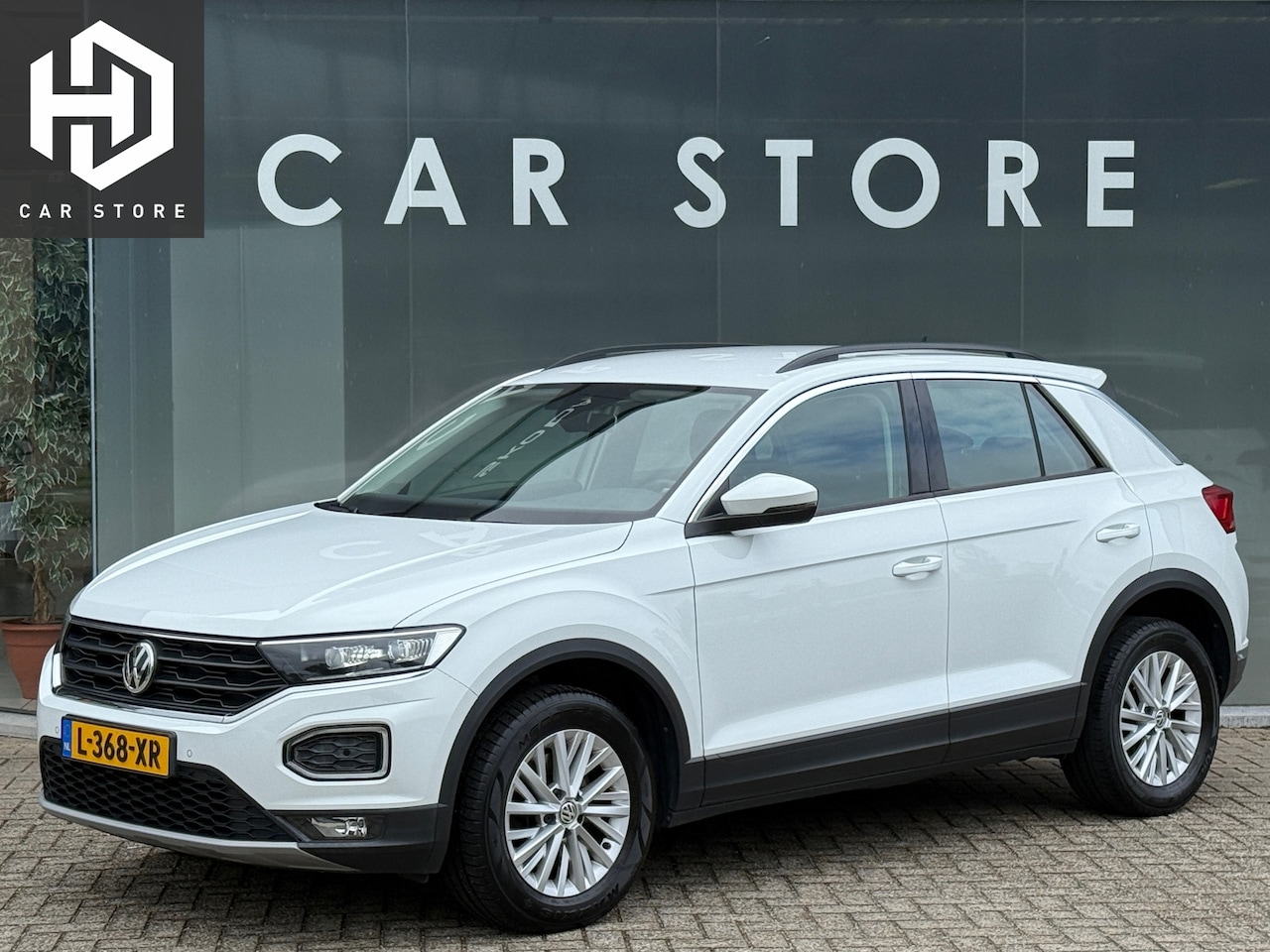 Volkswagen T-Roc - 1.5 TSI Sport Navi|Camera|Stoelver|Stuurverwarming - AutoWereld.nl