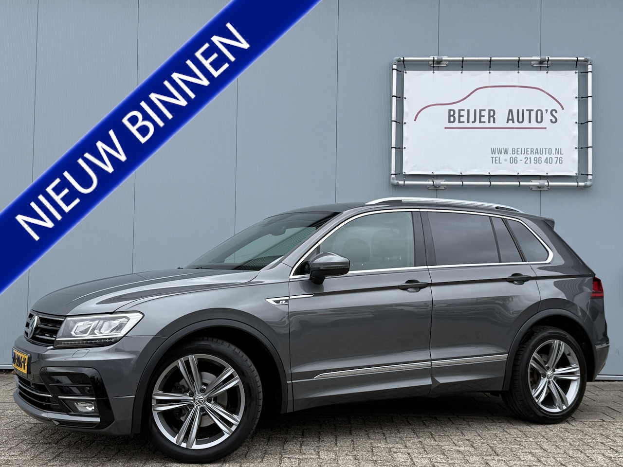 Volkswagen Tiguan - 1.4 TSI Highline Business R Trekhaak/Apple Carplay. - AutoWereld.nl
