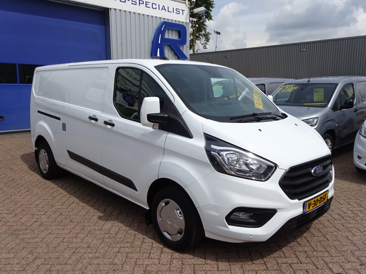 Ford Transit Custom - 300 2.0 TDCI L2H1 Limited AIRCO CRUISE CONTROL 3 ZITPLAATSEN - AutoWereld.nl
