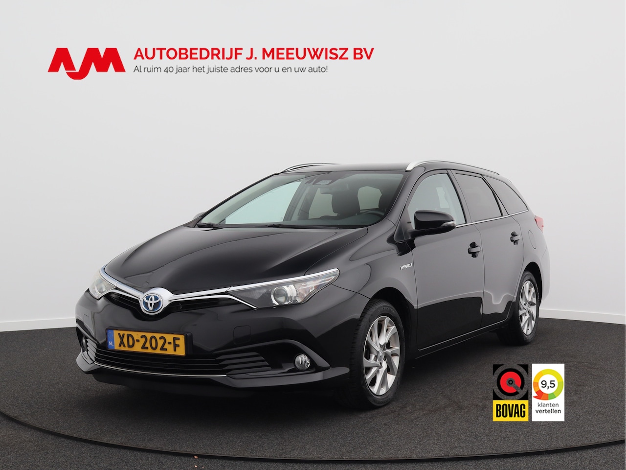 Toyota Auris Touring Sports - 1.8 Hybrid Energy Plus/ lage km/ zeer mooi! - AutoWereld.nl
