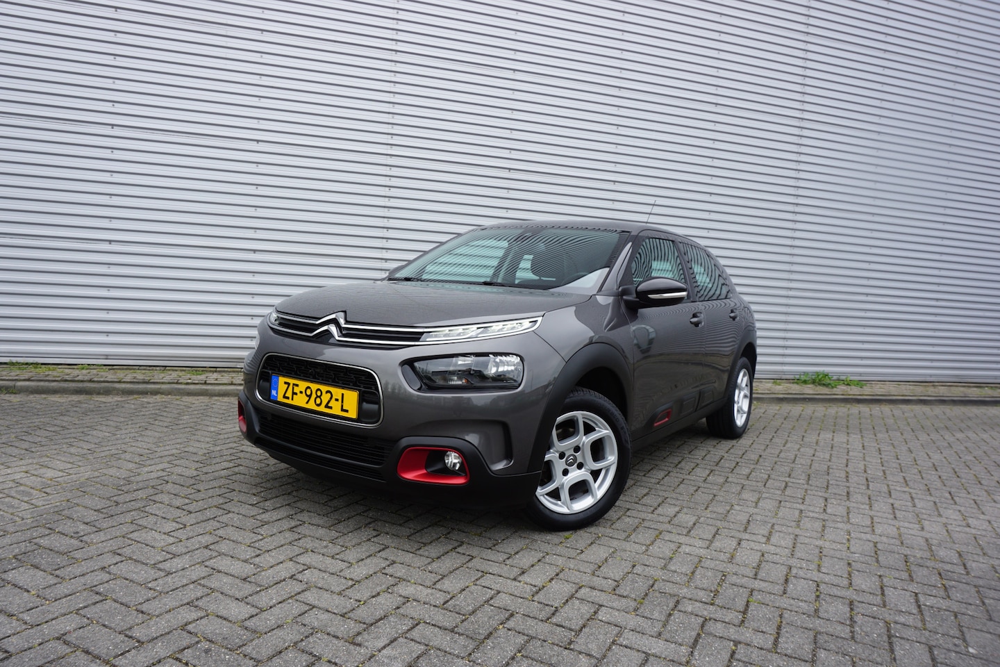 Citroën C4 Cactus - 1.2 PureTech Business Climate / Navi / Cruise / Camera / Elektr. ramen / Parkeers. / Nieuw - AutoWereld.nl