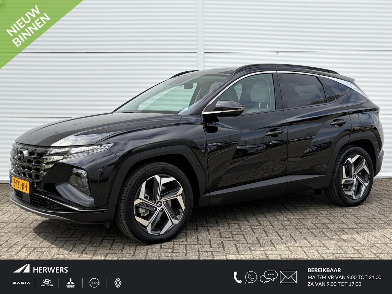Hyundai Tucson - 1.6 T-GDI PHEV Premium Sky 4WD / Trekhaak ( 1350 kg ) / Achterbank verwarmd / Stoel verkoe - AutoWereld.nl