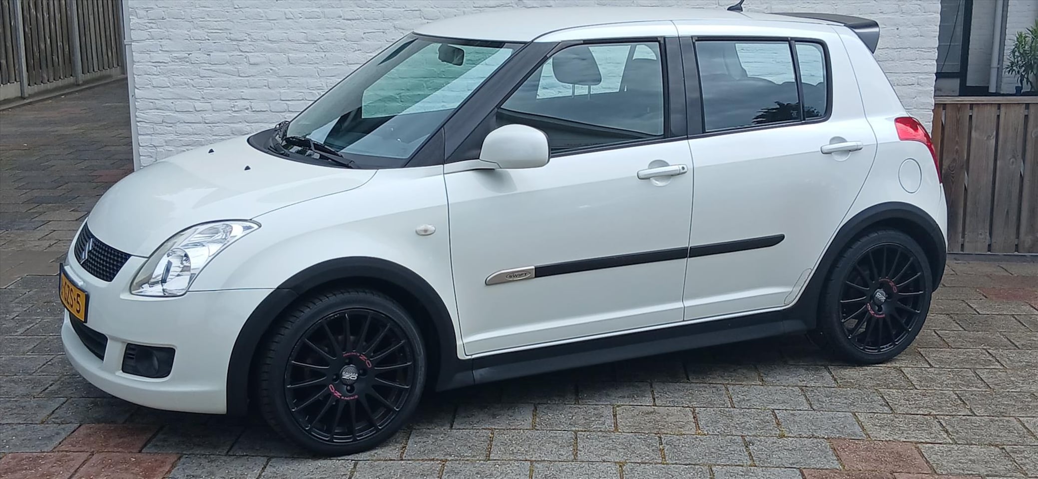 Suzuki Swift - 1.3 5D Shogun airco gt pakket 17 inch - AutoWereld.nl