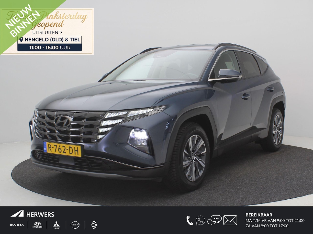 Hyundai Tucson - 1.6 T-GDI HEV Comfort AUTOMAAT / Navigatie / 1ste Eigenaar / 1650KG Trekgewicht / Adaptiev - AutoWereld.nl
