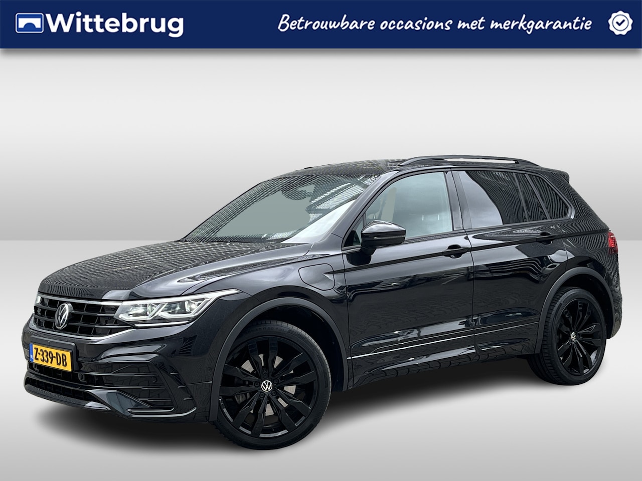 Volkswagen Tiguan - 1.4 TSI eHybrid R-Line Business+ / Pano / 360 Camera / Navigatie / App connect / Lichtmeta - AutoWereld.nl