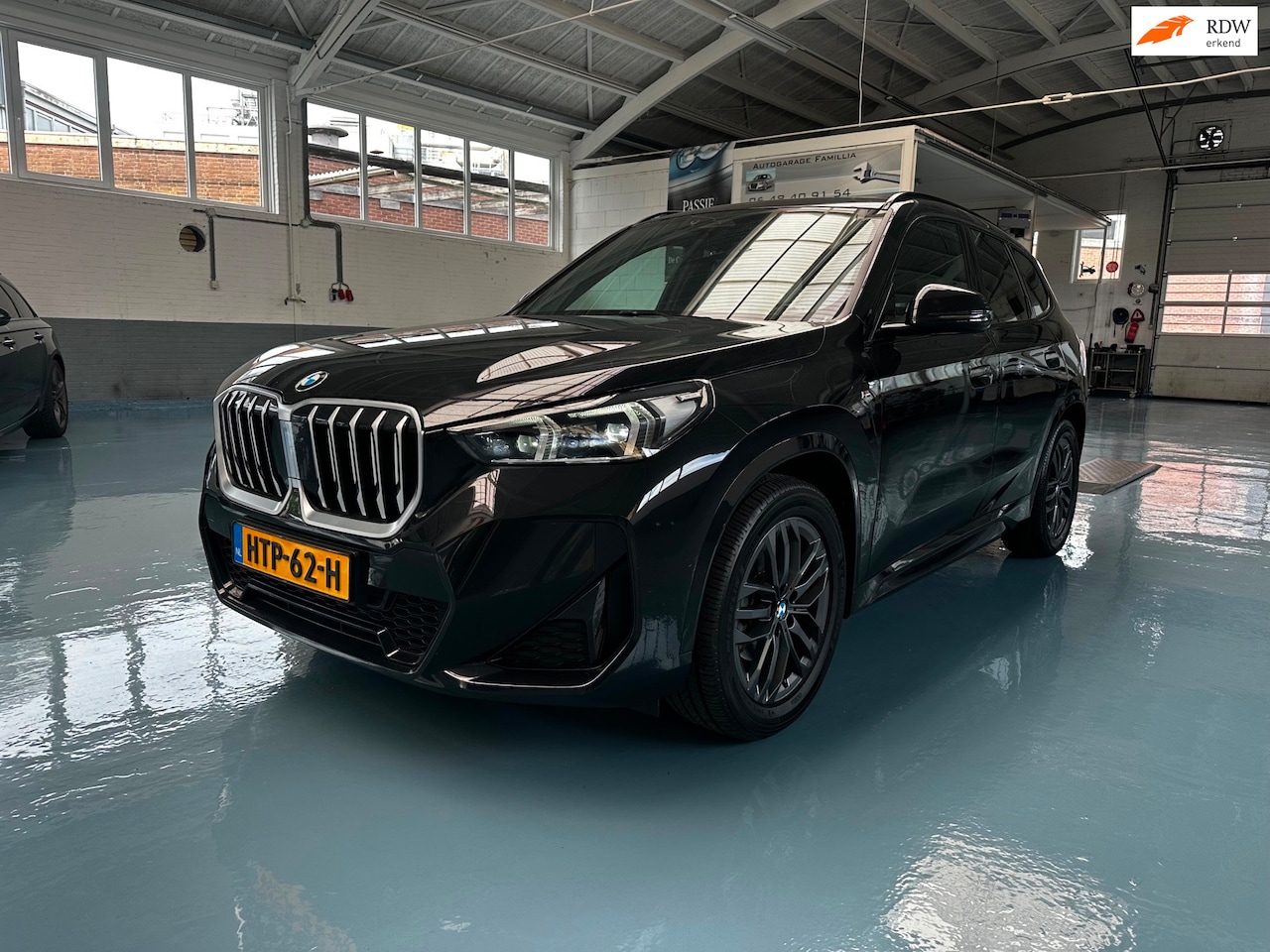 BMW X1 - SDrive18i Pano/Massage/elect.trekhaak/Harman Kardon - AutoWereld.nl
