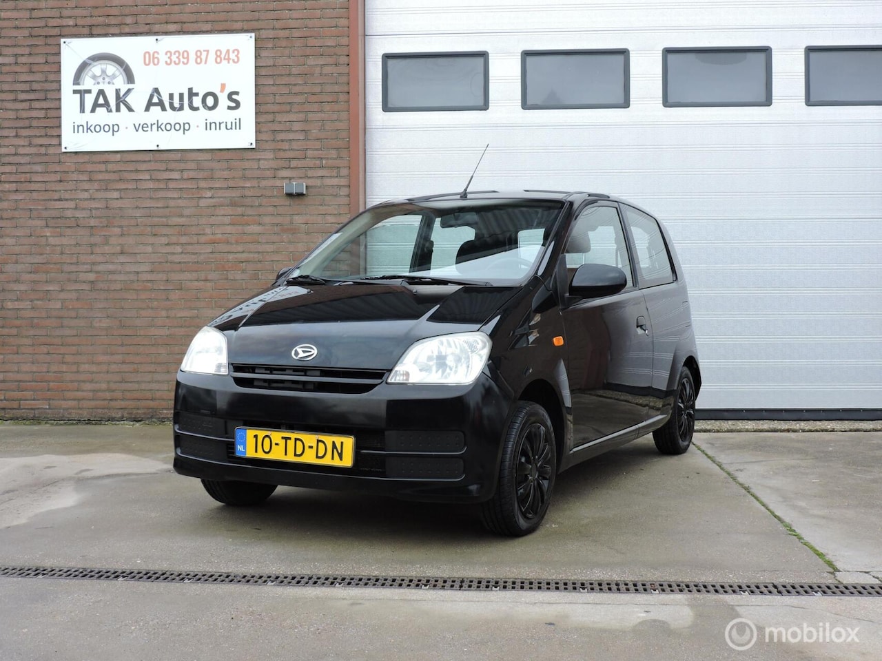 Daihatsu Cuore - 1.0-12V Sporty/Airco/Stuurbekr/Trekhaak - AutoWereld.nl