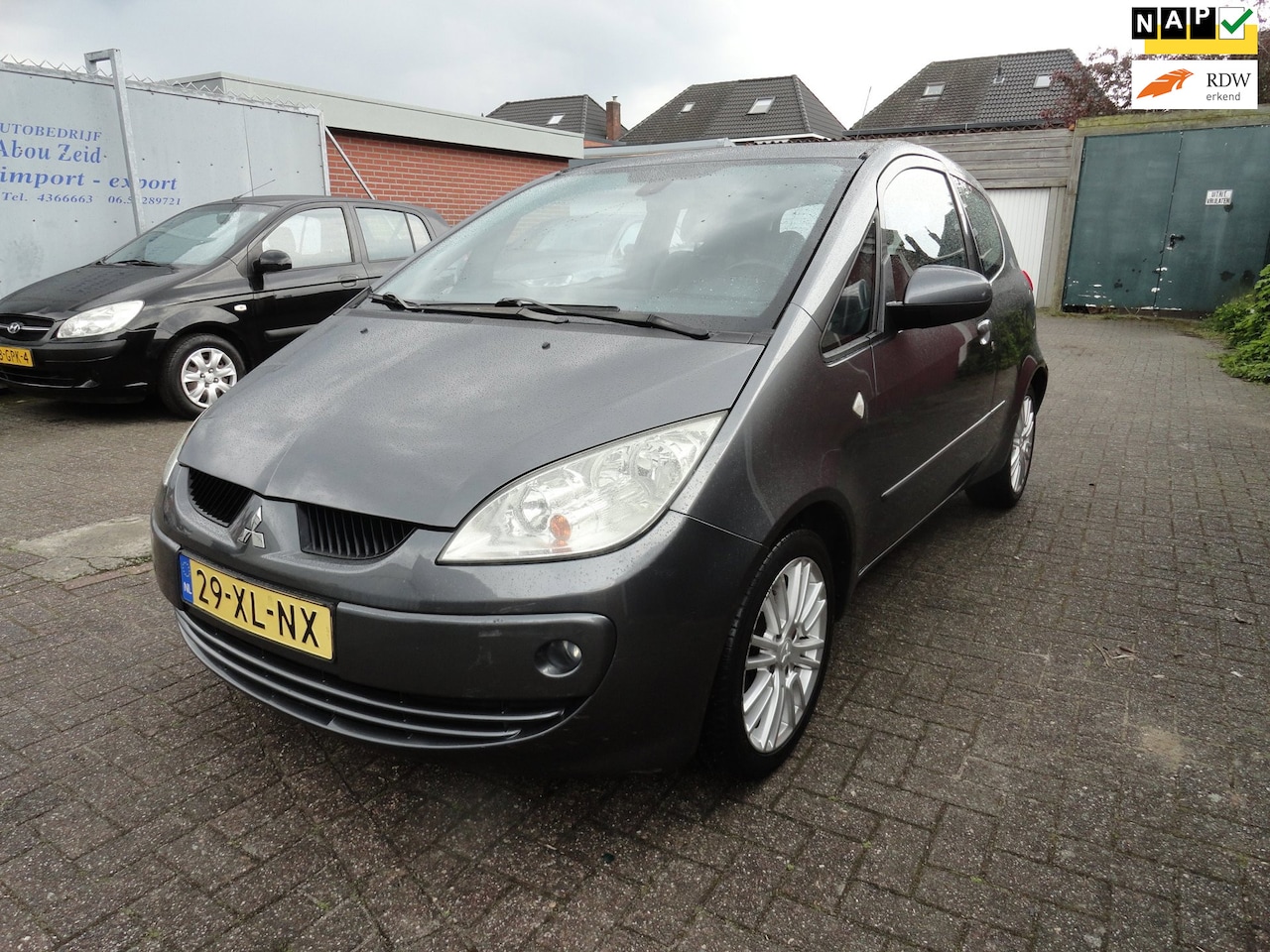 Mitsubishi Colt - 1.3 AUT Invite (KM 110920 NAP LEER AIRCO) - AutoWereld.nl
