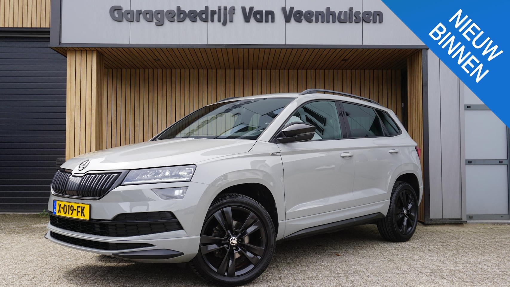 Skoda Karoq - 1.5 TSI 150pk DSG Sportline Business *Black Optik* LED Trekhaak Stoel & Stuurwiel V.W. Vir - AutoWereld.nl