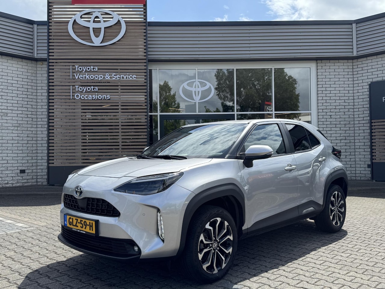 Toyota Yaris Cross - 1.5 HYBRID DYNAMIC+ STOEL/STUURVERW PARK-SENSOREN APPLE/ANDROID CLIMA AD-CRUISE 17" LM-VEL - AutoWereld.nl