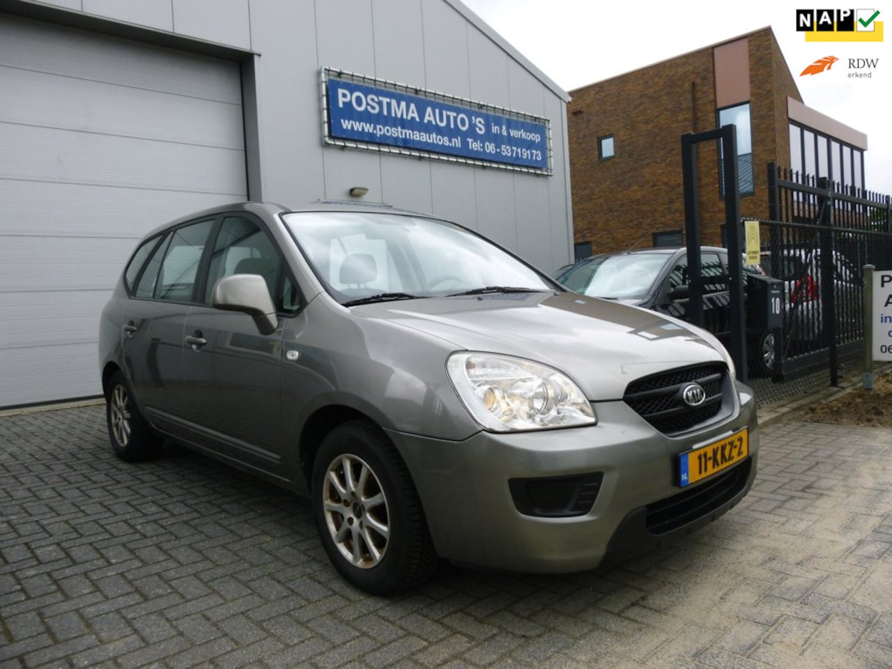 Kia Carens - 2.0 CVVT X-tra 2.0 CVVT X-tra, 1 eigenaar, airco, trekhaak. - AutoWereld.nl