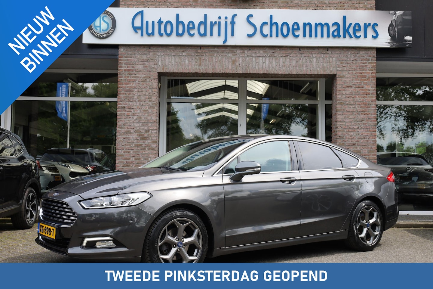 Ford Mondeo - 2.0 IVCT HEV Titanium RUITVERWARMING ALL-SEASONS NAVI DAB 18"LMV SFEERVERLICHTING 2xPDC NA - AutoWereld.nl