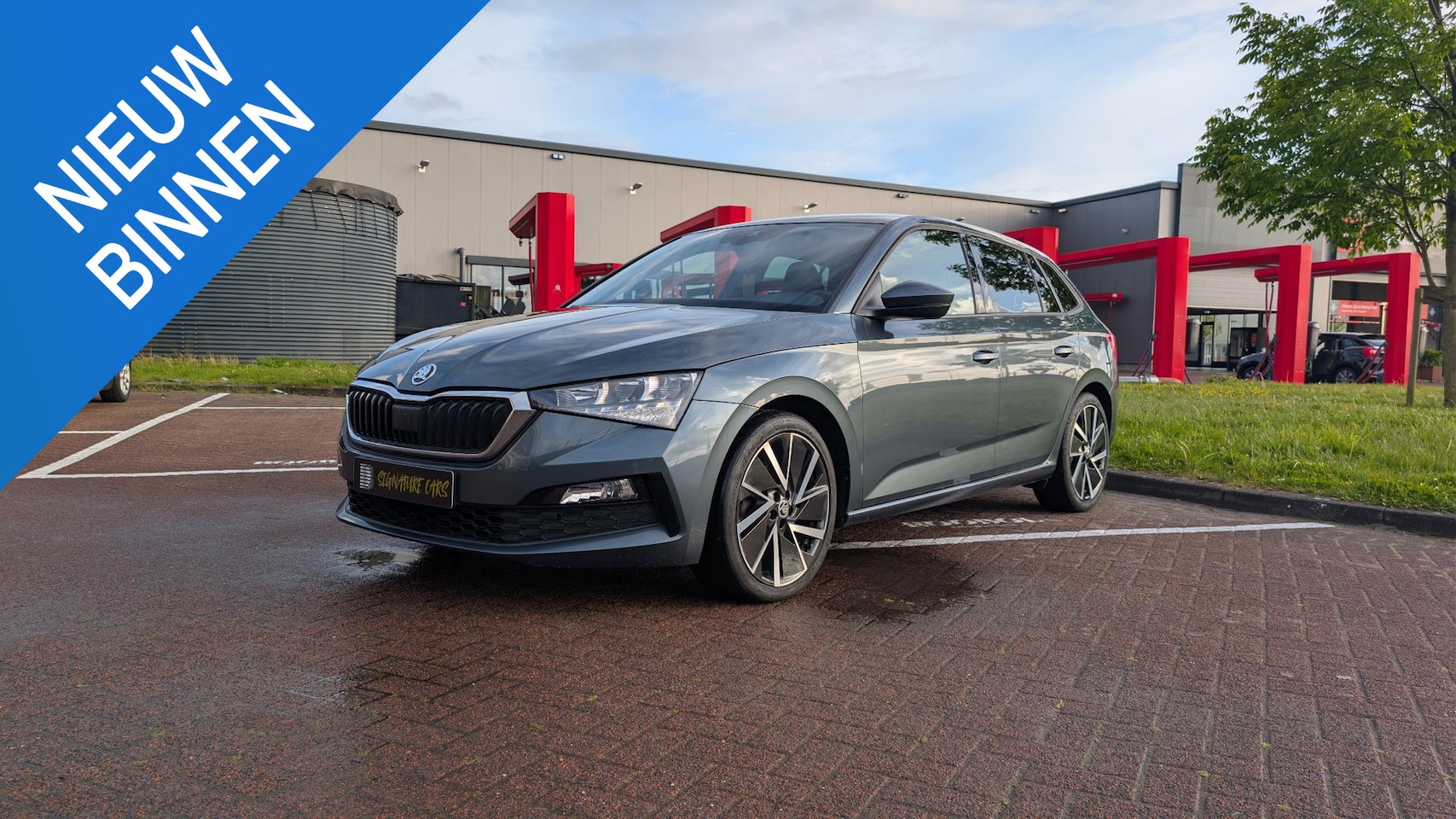 Skoda Scala - 1.0 TSI Sport Business PANO|DSG|Stoelverwarming|Cruise Control|Lane Assist| - AutoWereld.nl