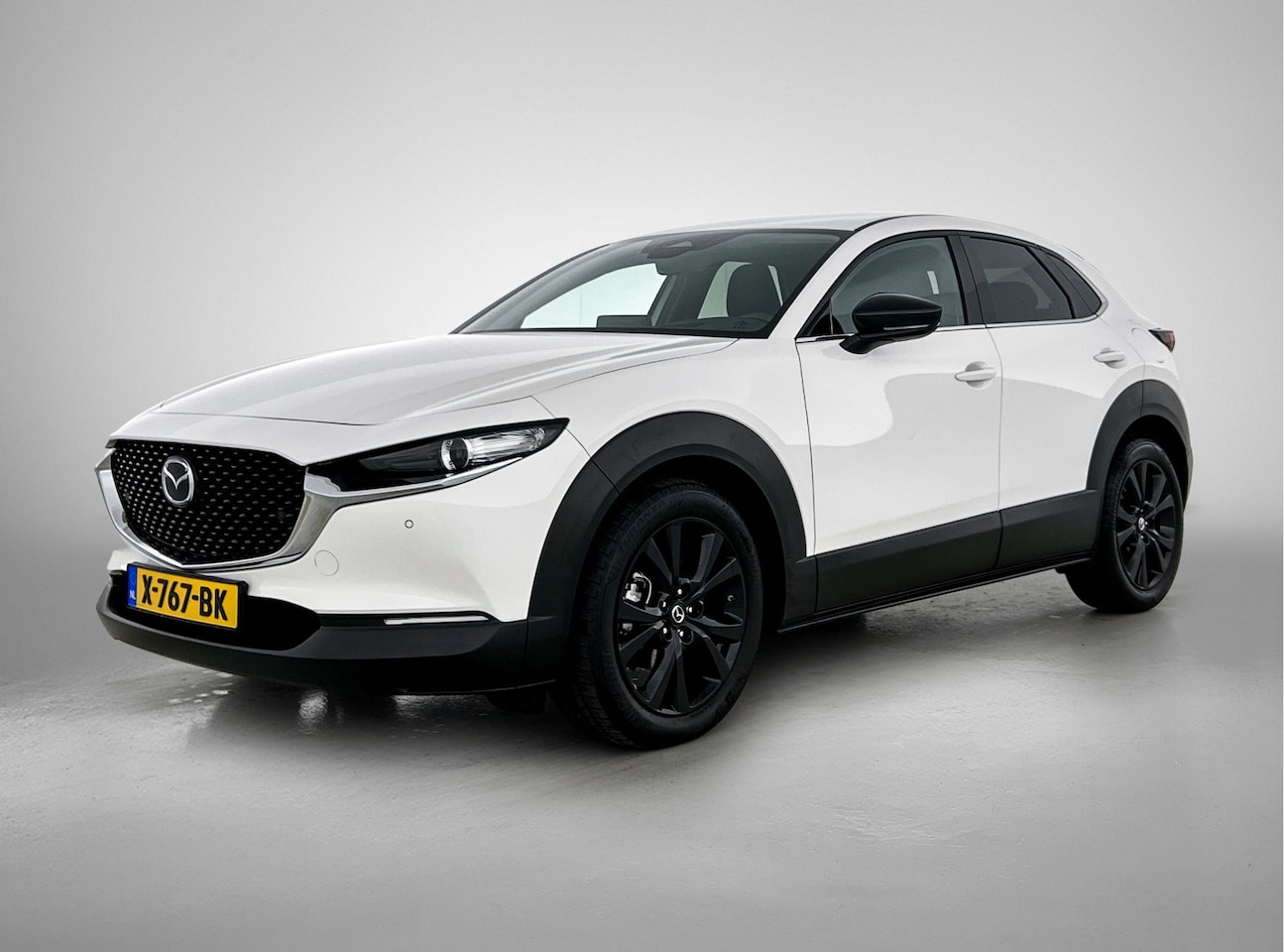 Mazda CX-30 - 2.0 e-SkyActiv-X M Hybrid Homura | Trekhaak | Parkeersensoren | Camera | Navigatie | - AutoWereld.nl