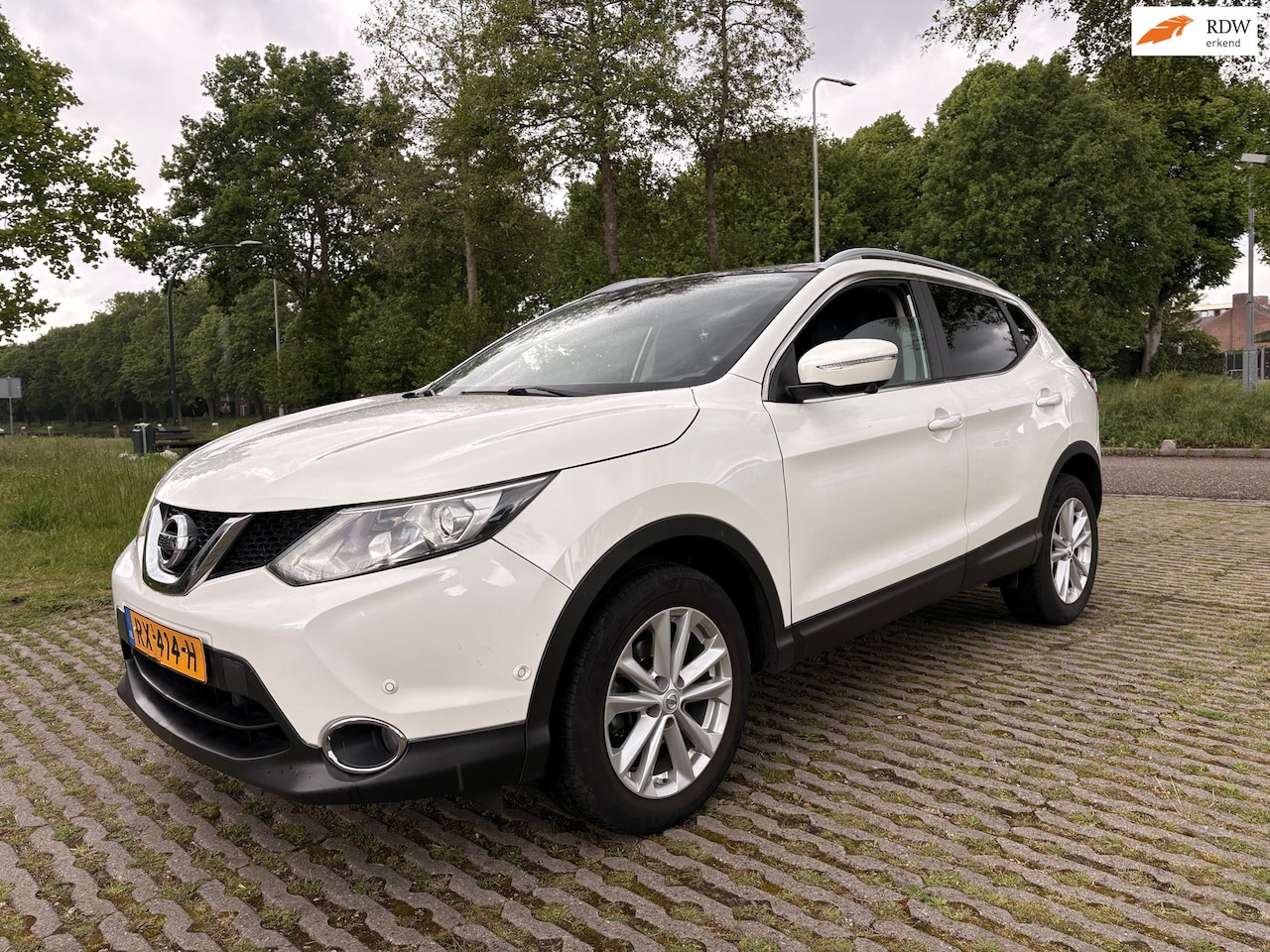 Nissan Qashqai - 1.2 Tekna - airco - stoelverwarming - cruise control - AutoWereld.nl