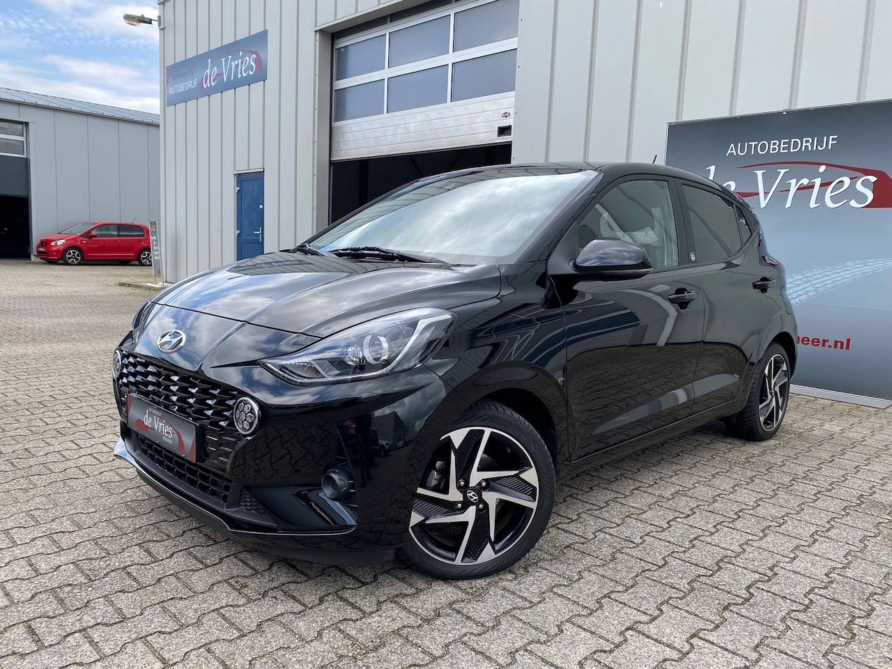 Hyundai i10 - 1.0 Comfort Smart / Airco / Cruise / Navi / Stoel en stuurverw. / Camera / PDC / LMV - AutoWereld.nl