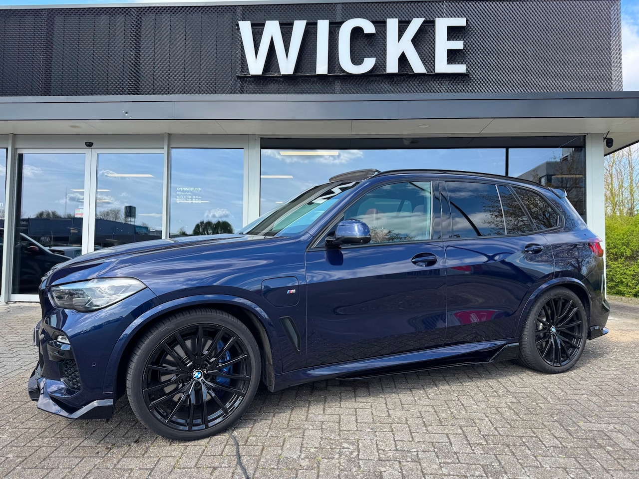 BMW X5 - XDrive45e High Executive Panorama HUD H&K Maxton 22" - AutoWereld.nl