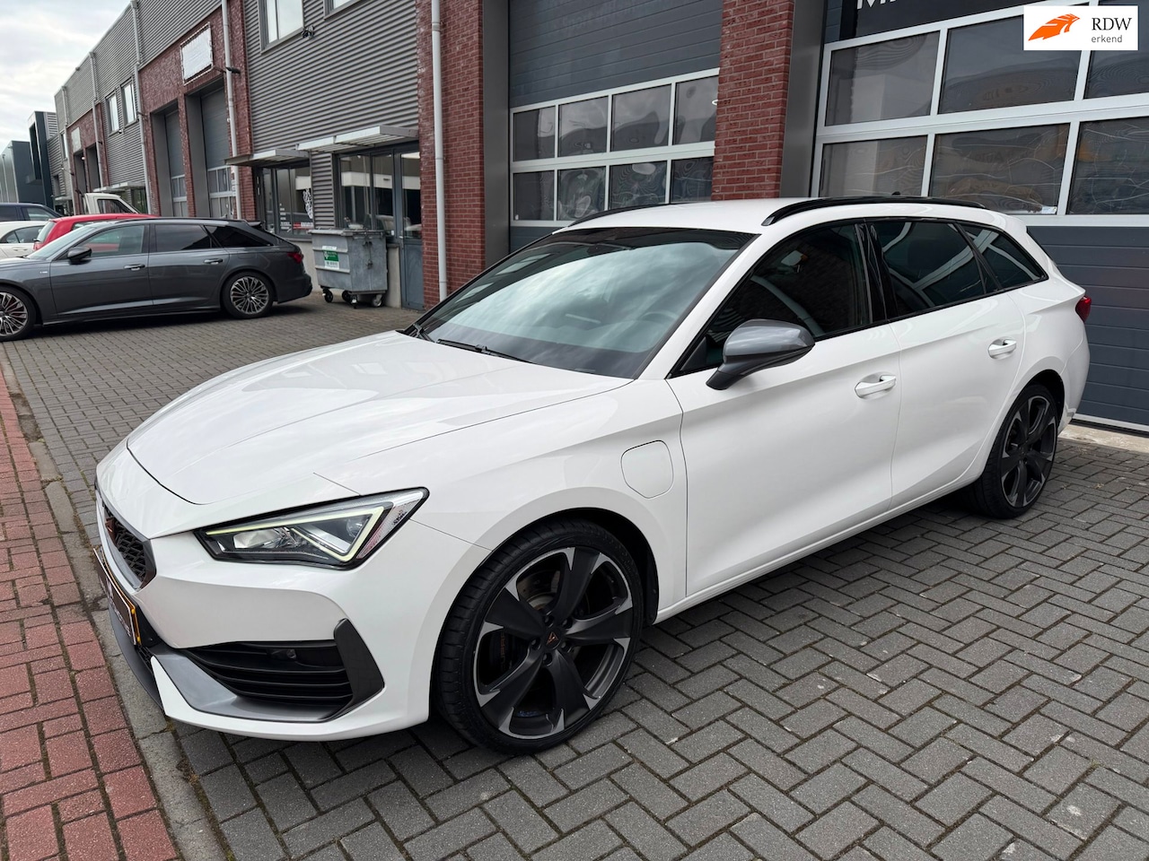 CUPRA Leon Sportstourer - 1.4 e-Hybrid 245 LED Sfeer Navi PDC - AutoWereld.nl