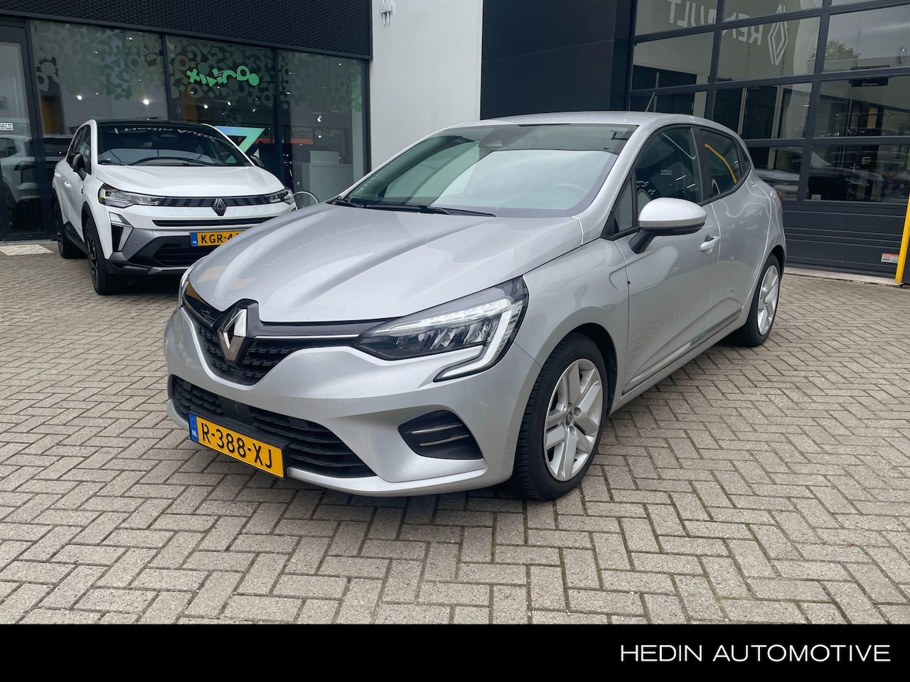 Renault Clio - 1.6 E-Tech Hybrid 140 Intens Parkeersensoren | Airco | Armsteun | - AutoWereld.nl