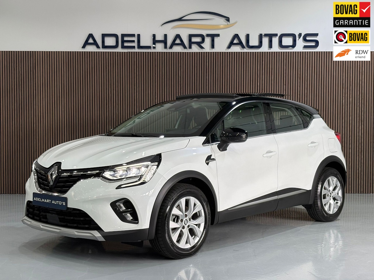 Renault Captur - 1.6 E-Tech Plug-in Hybrid 160 Automaat / Panorama dak / Adaptive Cruise control / Climate - AutoWereld.nl