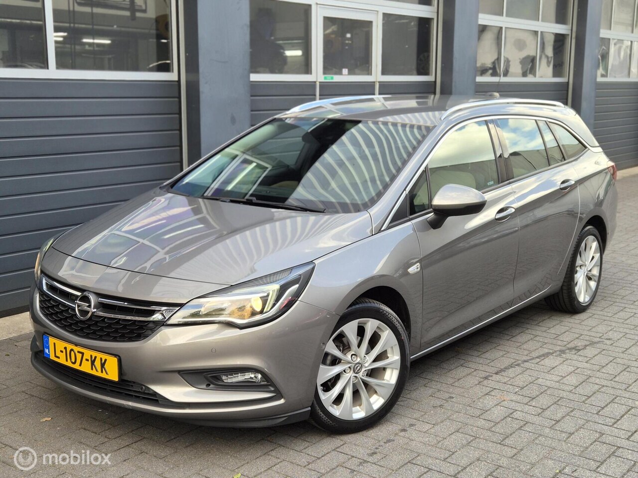 Opel Astra Sports Tourer - 1.4 Innovation | AUT | NAVI | STOEL.V | CAMERA | PDC | - AutoWereld.nl