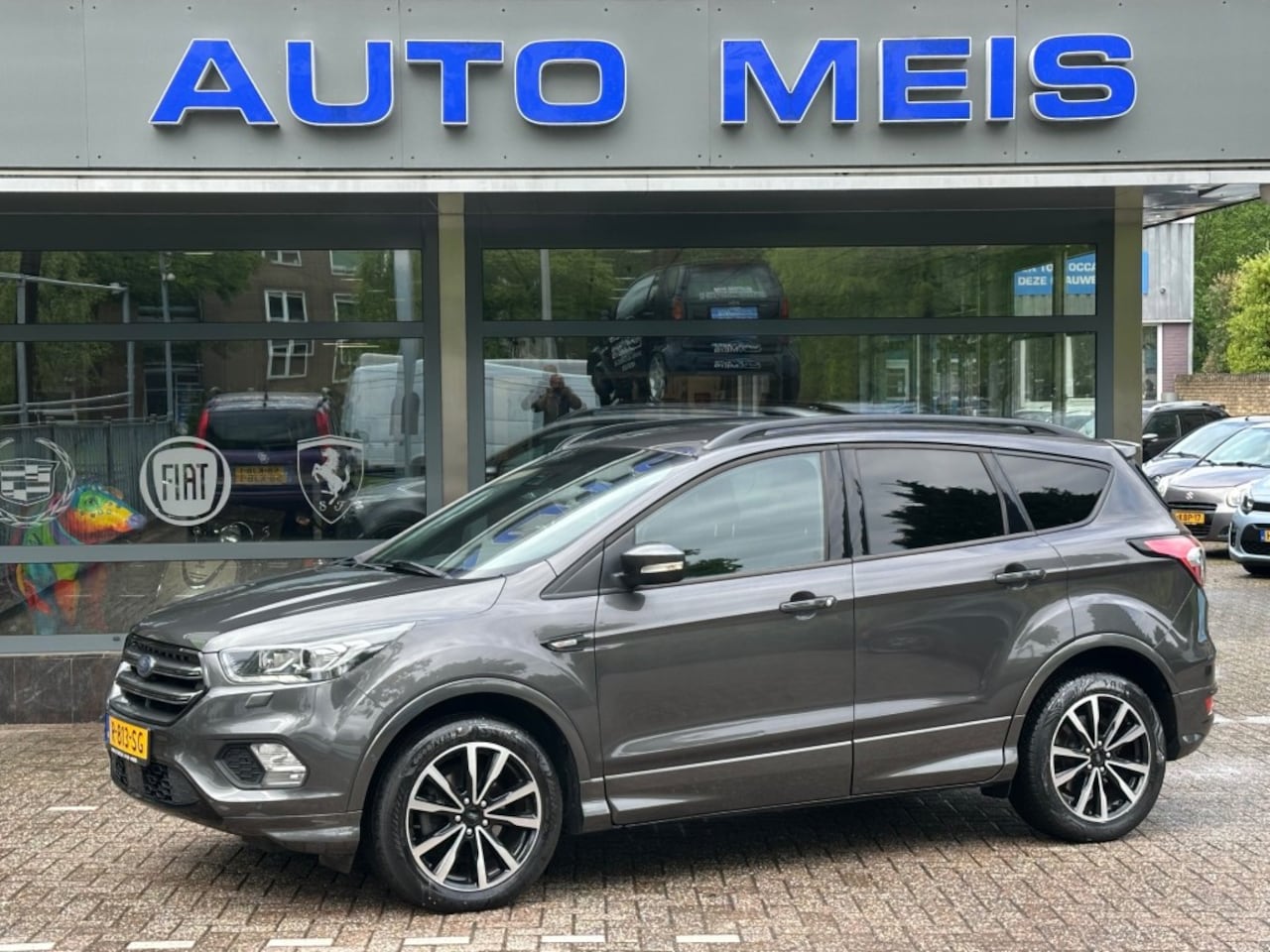 Ford Kuga - 1.5 Eco Boost ST Line  Airco Cruise Camera Telefoon Trekhaak - AutoWereld.nl