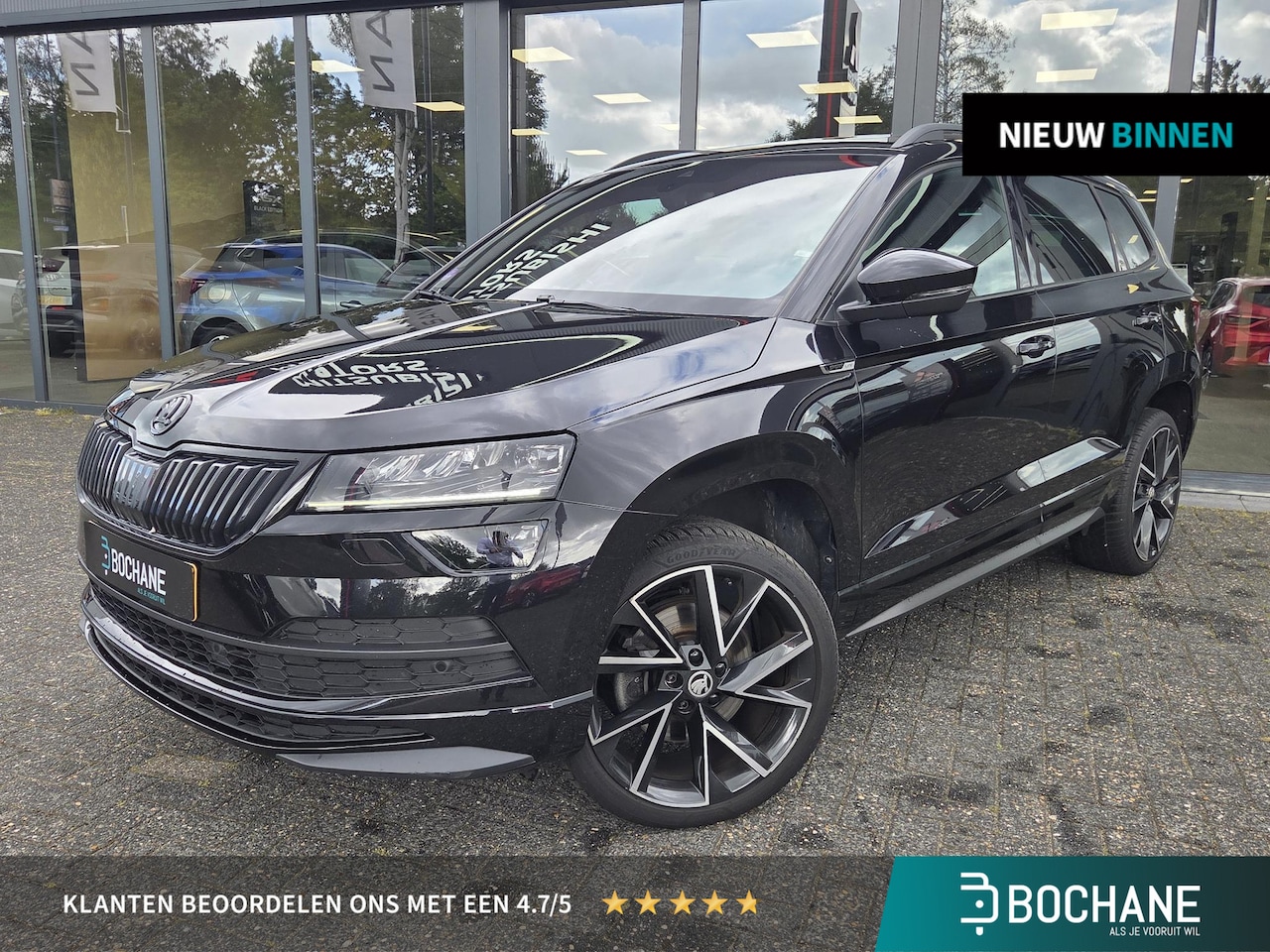 Skoda Karoq - 1.5 TSI ACT Sportline Business | AppleCarplay/AndroidAuto | Panoramadak | Automaat | - AutoWereld.nl