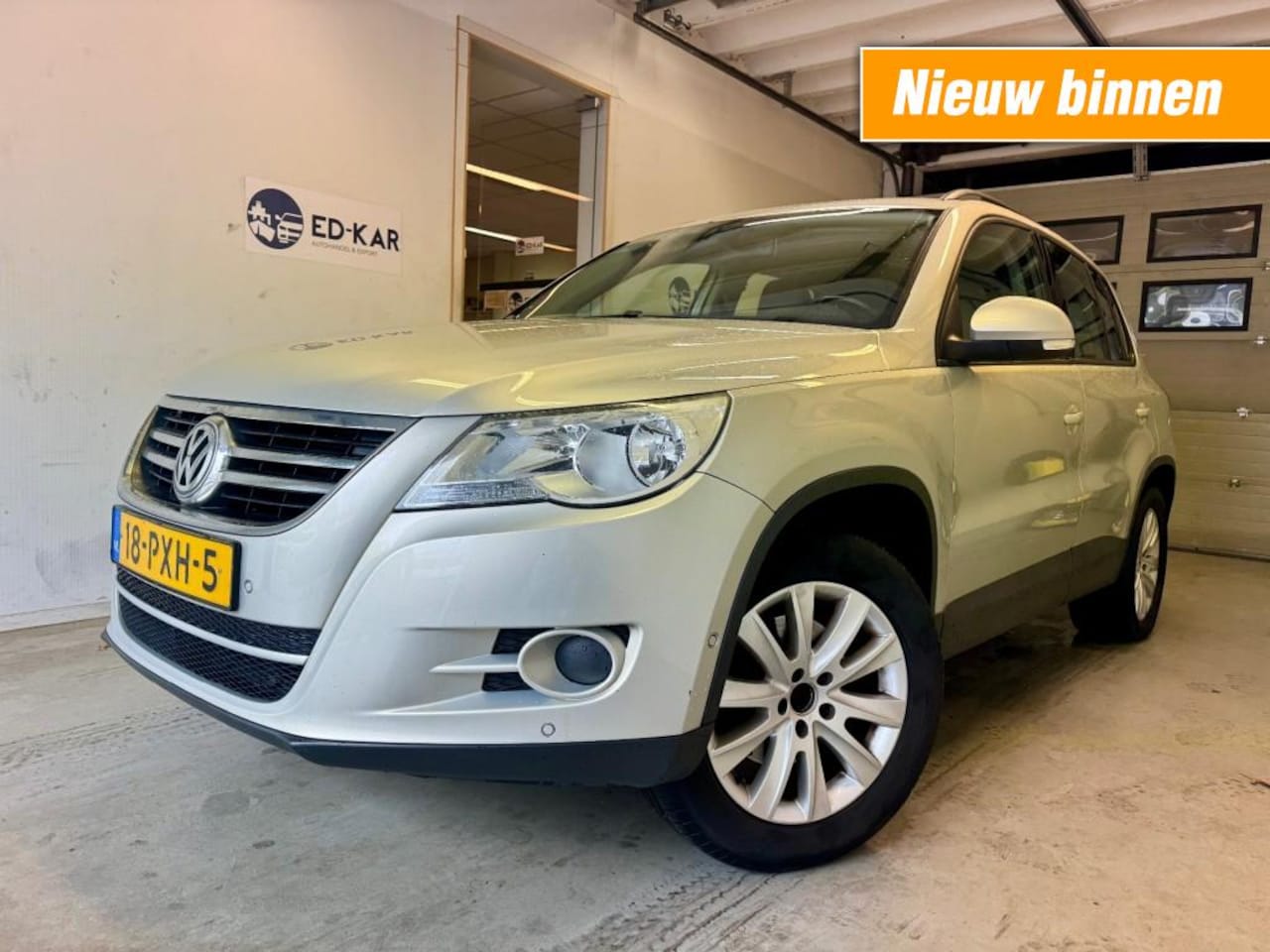 Volkswagen Tiguan - 1.4 TSI ComfortenDesign 2DE EIG NETTE AUTO NAP APK 4-2027 - AutoWereld.nl