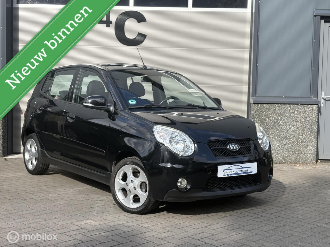 Kia Picanto - 1.1 SportbyKia 2012 zwart 5 deurs - AutoWereld.nl