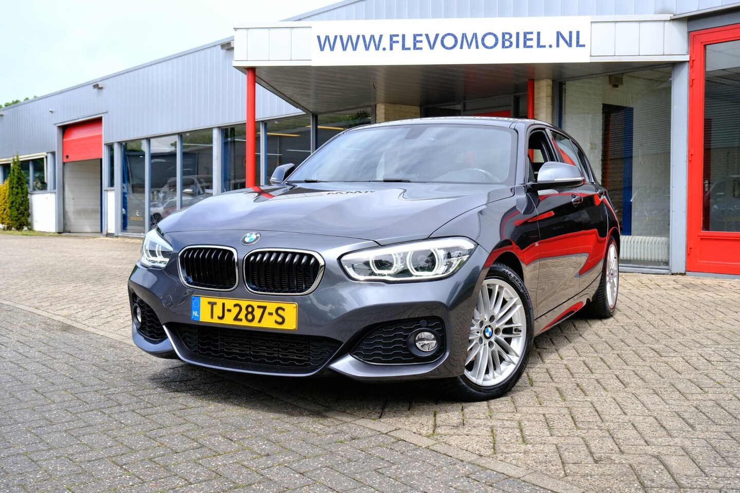 BMW 1-serie - 118i M Sport Aut. Leder|1e Eig|Navi|Sportstoelen|Clima - AutoWereld.nl