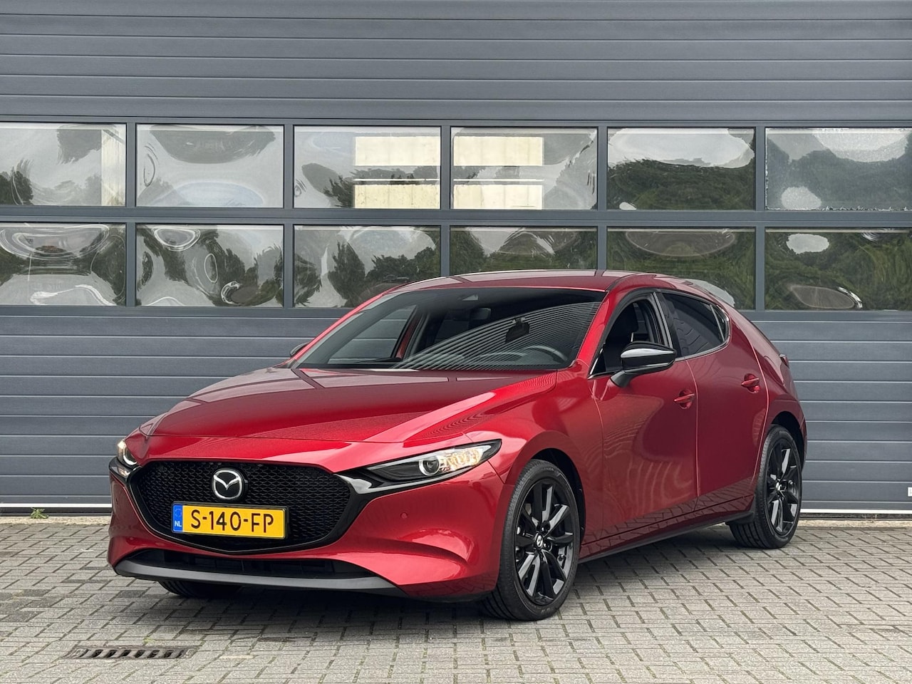 Mazda 3 - 2.0 E-SKYACTIV-G M HYBRID 150 HOMURA I AUTOMAAT I P-CAMERA I ADAPTIVE CRUISE CONTROL I STO - AutoWereld.nl